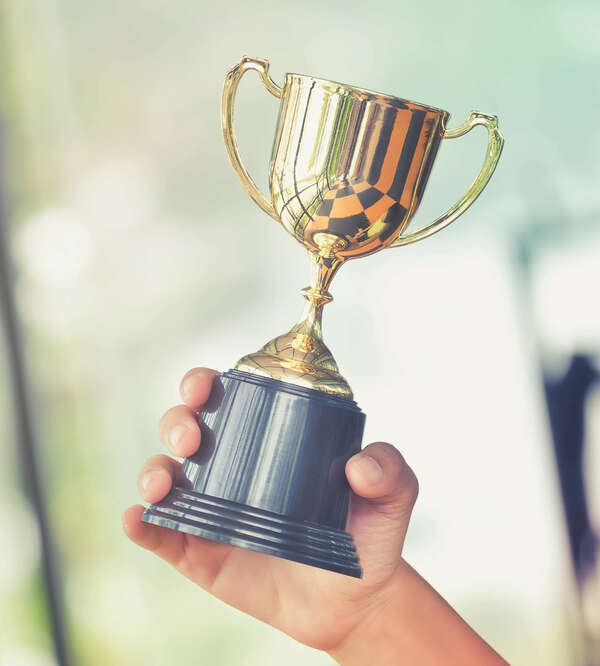 A cup is held by one hand