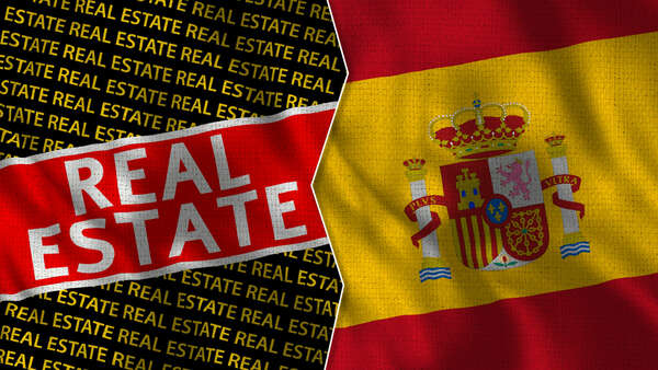 Spanish flag and Real Estate inscription