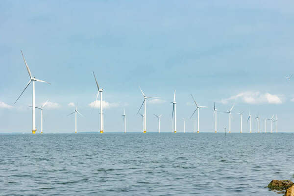 Windmill turbines at the sea