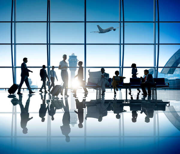 People Walking in an Airport