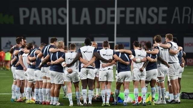 all the Racing 92 professional rugby team seen from the back