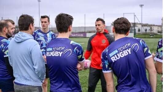 rugbymen being coached